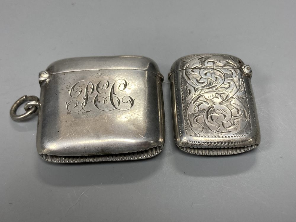 Two silver cigarette cases including late Victorian with military related inscription, two silver vesta cases, etc.